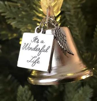 It's A Wonderful Life Inspired Christmas Angel Bell Ornament with Angel Wing Charm. Comes with 2 Interchangeable Ribbons.
It's A Wonderful Life Inspired Christmas Angel Bell Ornament with Angel Wing Charm. Comes with 2 Interchangeable Ribbons.