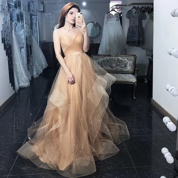 Champagne Spray Gold Tulle Prom Dress Spaghetti Strap Shiny Sexy V-Neck Wedding Guest Evening Party Dress Long Graduation Gowns
Champagne Spray Gold Tulle Prom Dress Spaghetti Strap Shiny Sexy V-Neck Wedding Guest Evening Party Dress Long Graduation Gowns