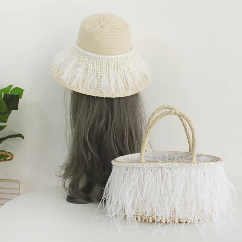 Handmade Straw Bags Women Weaving Rattan Totes Ladies Feather Pearl Tassel Beach Handbags with Sun Hat 2021 NEW Summer
Handmade Straw Bags Women Weaving Rattan Totes Ladies Feather Pearl Tassel Beach Handbags with Sun Hat 2021 NEW Summer