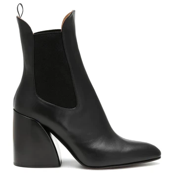 Europe and the United States new wedges wide tube fashion short boots elastic section leather round head brand women's boots 
Europe and the United States new wedges wide tube fashion short boots elastic section leather round head brand women's boots