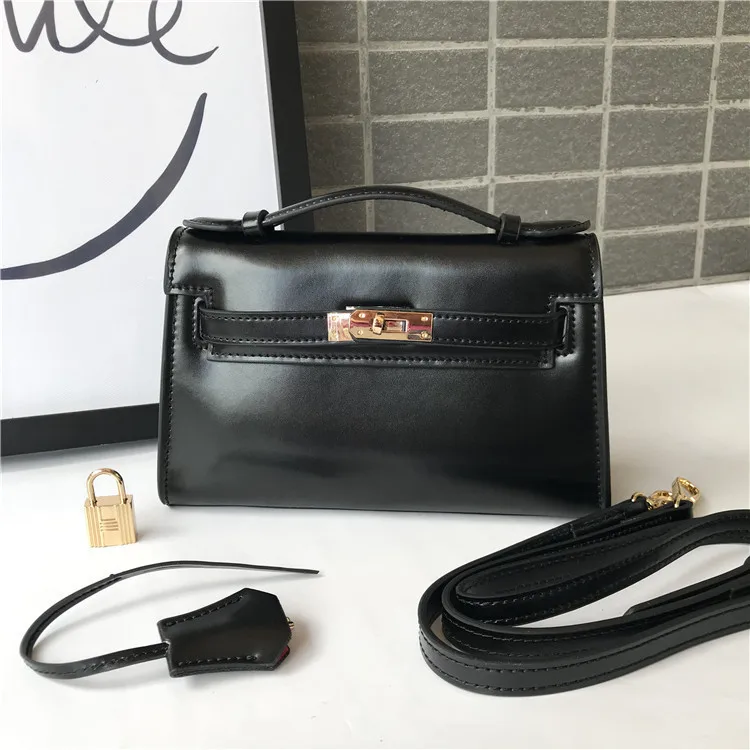 Genuine Leather Female Box Mirror Dough kay Hand Take Single Shoulder Diagonal Small Bag
Genuine Leather Female Box Mirror Dough kay Hand Take Single Shoulder Diagonal Small Bag