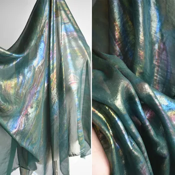 Soft Dark Green Colored Bronzing Chiffon Tulle Fabric for Dress Designer Fabrics, by the Meter
Soft Dark Green Colored Bronzing Chiffon Tulle Fabric for Dress Designer Fabrics, by the Meter