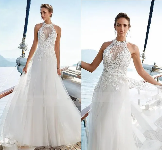 Halter Neck Lace Applique A-line Soft Tulle Wedding Dress with Illusion Lace Button Back Sweep Train Boho Bridal Dress
Halter Neck Lace Applique A-line Soft Tulle Wedding Dress with Illusion Lace Button Back Sweep Train Boho Bridal Dress