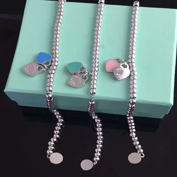 Women Luxury brands Logo Double love heart 4mm round bead bracelet S925 Sterling silver 1:1 original High-end jewelry gifts
Women Luxury brands Logo Double love heart 4mm round bead bracelet S925 Sterling silver 1:1 original High-end jewelry gifts