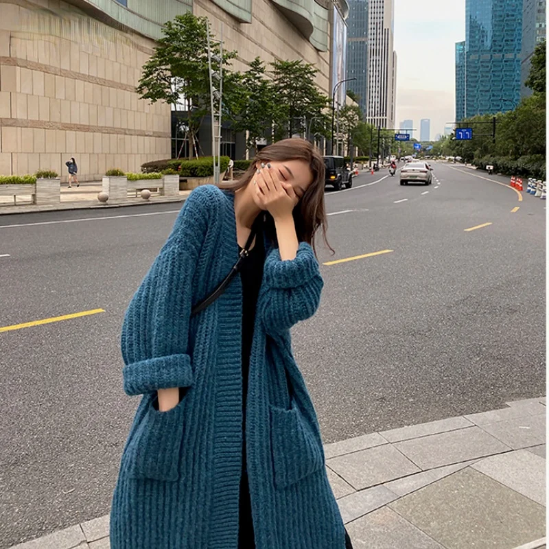Женский вязаный кардиган с открытым стежком, однотонный длинный Свободный Повседневный Кардиган в винтажном стиле, Осень-зима 2021
Женский вязаный кардиган с открытым стежком, однотонный длинный Свободный Повседневный Кардиган в винтажном стиле, Осень-зима 2021