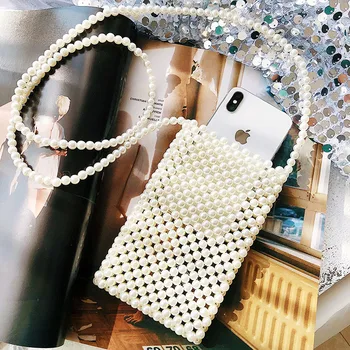 Handmade pearl aslant package small mini bag design mobile phone pearl bag knitting fashion female bag bag 
Handmade pearl aslant package small mini bag design mobile phone pearl bag knitting fashion female bag bag