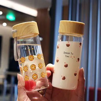 Creative Cute Dessert Glass Brief Transparent Cup with Wooden Lid 300ml High Temperature Resistant Outdoor Portable Water Bottle
Creative Cute Dessert Glass Brief Transparent Cup with Wooden Lid 300ml High Temperature Resistant Outdoor Portable Water Bottle