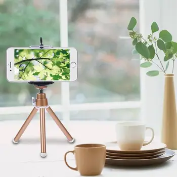 Universal Mini Flexible Camera Phone Tripod Stand Holder+ Clip Small & Llightweight Design Practical Photographic Equipment
Universal Mini Flexible Camera Phone Tripod Stand Holder+ Clip Small & Llightweight Design Practical Photographic Equipment