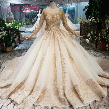 AXJFU luxury princess beading crystal golden flower lace handmade o neck bride illusion long sleeve handmade wedding dress 1133
AXJFU luxury princess beading crystal golden flower lace handmade o neck bride illusion long sleeve handmade wedding dress 1133