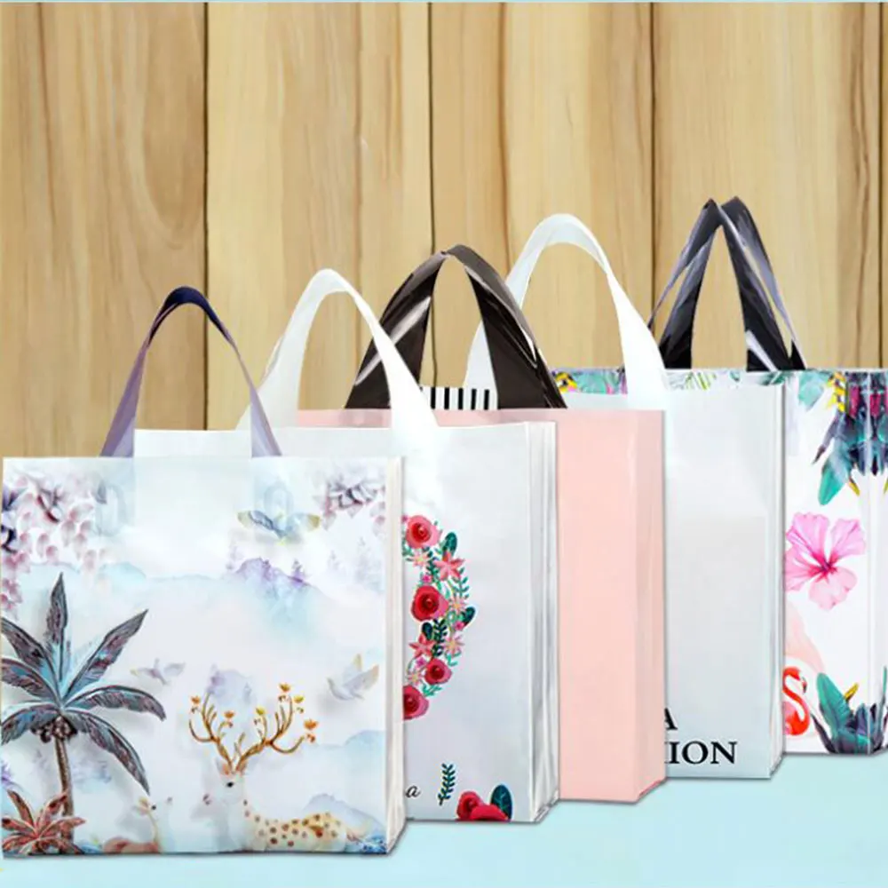 50PCS/LOT 30X25cm bottom 8cm Plastic Gift Bag Varied Large Shopping Handle Bags Birthday Party Decoration Favor Packaging Bags
50PCS/LOT 30X25cm bottom 8cm Plastic Gift Bag Varied Large Shopping Handle Bags Birthday Party Decoration Favor Packaging Bags