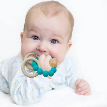 Infant Silicone Nursing Bracelet for Baby Wooden Teethers Teething Grasping Baby Teether Bracelet Chew Newborn Pain Relief Toy
Infant Silicone Nursing Bracelet for Baby Wooden Teethers Teething Grasping Baby Teether Bracelet Chew Newborn Pain Relief Toy