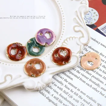 DIY Handmade Jewelry Fittings Retro-archaic Alloy Dropping Oil Irregular Circular Hanging Earrings and Earrings Material
DIY Handmade Jewelry Fittings Retro-archaic Alloy Dropping Oil Irregular Circular Hanging Earrings and Earrings Material