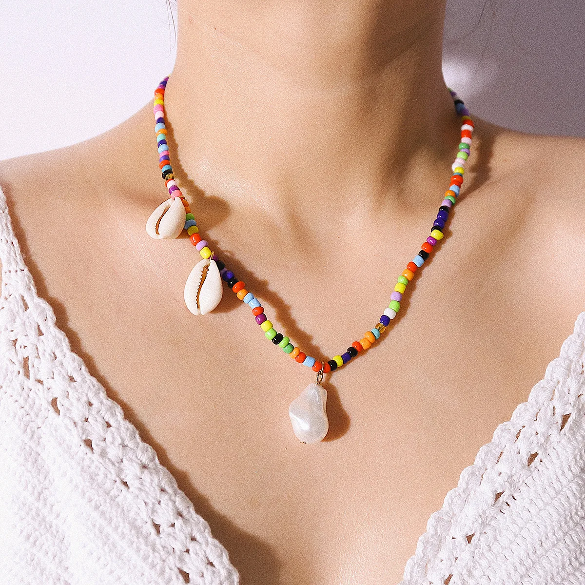 Fashion Colorful Bead Cowrie Shell Choker Necklace for Women Irregular Imitation Pearl Pendant Necklace Statement Strand Collier
Fashion Colorful Bead Cowrie Shell Choker Necklace for Women Irregular Imitation Pearl Pendant Necklace Statement Strand Collier