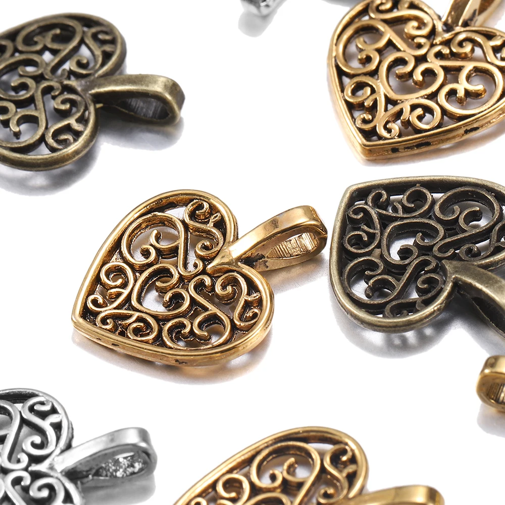 30pcs/lot Tibetan Bronze Plated Hollow Out Heart Antique Pendants Findings DIY Charms Bracelet Jewelry Making Supplies 30pcs/lot Tibetan Bronze Plated Hollow Out Heart Antique Pendants Findings DIY Charms Bracelet Jewelry Making Supplies