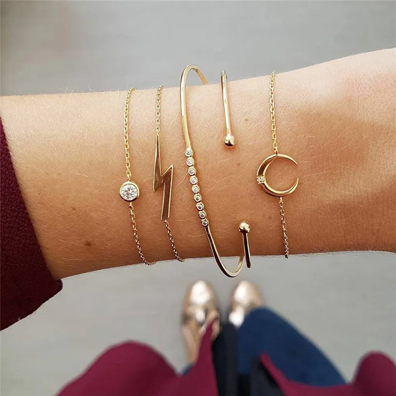 VAGZEB 5Pcs/Set Fashion Women Charm Beach Gold Color Chain Moon Lightning Crystal bangle Bracelet Set for Woman
VAGZEB 5Pcs/Set Fashion Women Charm Beach Gold Color Chain Moon Lightning Crystal bangle Bracelet Set for Woman