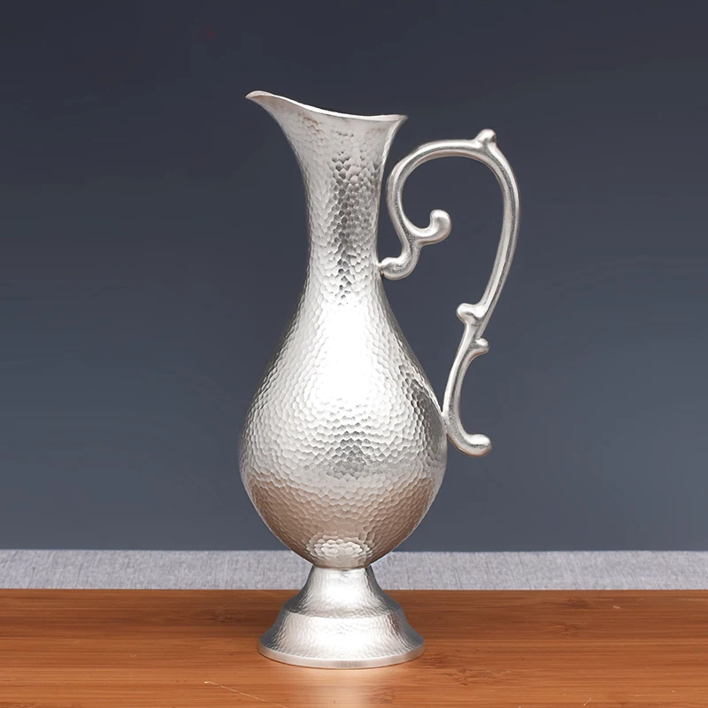 European classical sterling silver wine jug 999 hammer pattern wine cabinet household high-end silver jug
European classical sterling silver wine jug 999 hammer pattern wine cabinet household high-end silver jug