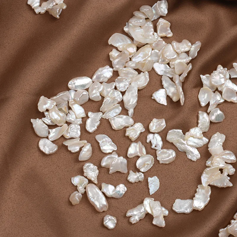 10g/5-10mm,Strong luster natural freshwater Baroque pearl beads,white Regenerated Pearl Thin sheet DIY inlaid manicure material
10g/5-10mm,Strong luster natural freshwater Baroque pearl beads,white Regenerated Pearl Thin sheet DIY inlaid manicure material