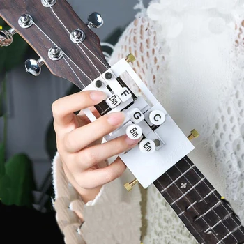 Lazy Auxiliary Artifact Guitar Chord Buddy Teaching Aid Guitar Tool Ukulele Learning System Teaching Aid Musical Accessories
Lazy Auxiliary Artifact Guitar Chord Buddy Teaching Aid Guitar Tool Ukulele Learning System Teaching Aid Musical Accessories