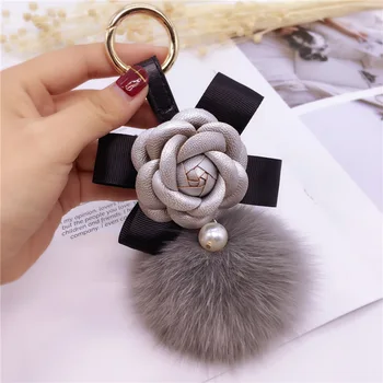 Korea Creative Bow Camellia Key Chain Bag Pendant Ladies Fox Fur Ball Key Ring Fashion Charm Pendant Luxury Keychain
Korea Creative Bow Camellia Key Chain Bag Pendant Ladies Fox Fur Ball Key Ring Fashion Charm Pendant Luxury Keychain