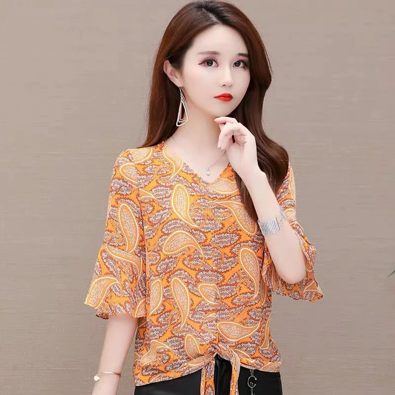 Women Spring Summer Style Chiffon Blouses Shirts Lady Casual Short Flare Sleeve Flower Printed V-Neck Blusas Tops DF2915
Women Spring Summer Style Chiffon Blouses Shirts Lady Casual Short Flare Sleeve Flower Printed V-Neck Blusas Tops DF2915