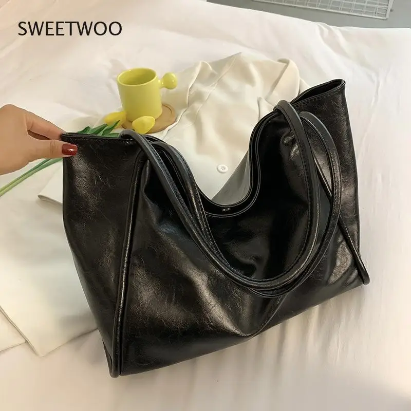 Large-capacity bag female 2021 autumn new fashion one-shoulder commuter bag big bag pu tote bag
Large-capacity bag female 2021 autumn new fashion one-shoulder commuter bag big bag pu tote bag