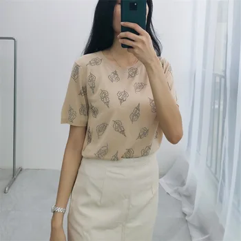 Hot drill leaves Women Knitted t-shirt 2020 New Summer Female shiny simple loose tee top short sleeve wild knitwear t shirt
Hot drill leaves Women Knitted t-shirt 2020 New Summer Female shiny simple loose tee top short sleeve wild knitwear t shirt
