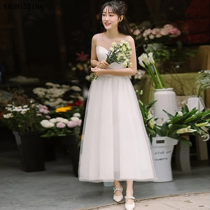 KAUNISSINA дешевое свадебное платье Vestidos De Novia для женщин на тонких бретелях с сердцевидным белого цвета без рукавов с фатиновой юбкой Простые Свадебные платья
KAUNISSINA дешевое свадебное платье Vestidos De Novia для женщин на тонких бретелях с сердцевидным белого цвета без рукавов с фатиновой юбкой Простые Свадебные платья