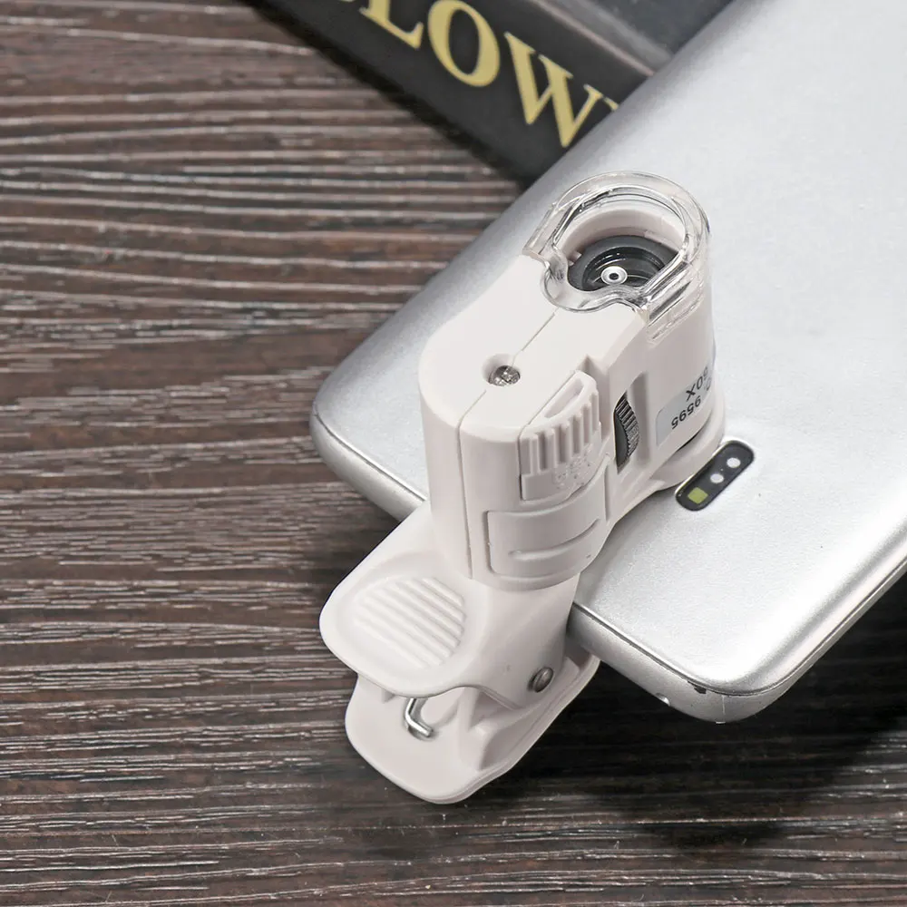 Universal 60X Mobile Phone Microscope Macro Lens Zoom Micro Camera Clip with LED Light Phone lens
Universal 60X Mobile Phone Microscope Macro Lens Zoom Micro Camera Clip with LED Light Phone lens