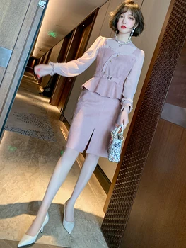 Fashion commuter temperament stitching slim waist top + high waist split half skirt suit female 2020 early autumn new 
Fashion commuter temperament stitching slim waist top + high waist split half skirt suit female 2020 early autumn new