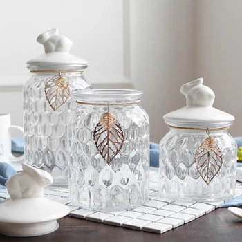 Luxury Transparent Glass Candy Jar with Ceramic Rabbit Cover Wedding Decoration Bottle Kitchen Miscellaneous Grain Storage Tank
Luxury Transparent Glass Candy Jar with Ceramic Rabbit Cover Wedding Decoration Bottle Kitchen Miscellaneous Grain Storage Tank