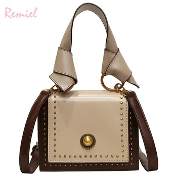 Luxury Handbag 2020 Fashion New Rivet Tote bag High Quality PU Leather Women's Designer Handbag Portable Shoulder Messenger Bags 
Luxury Handbag 2020 Fashion New Rivet Tote bag High Quality PU Leather Women's Designer Handbag Portable Shoulder Messenger Bags