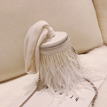Elegant Female Tote Pearl Feather Bucket Bag 2020 New High Quality Leather Women's Designer Handbag Chain Shoulder Messenger Bag 
Elegant Female Tote Pearl Feather Bucket Bag 2020 New High Quality Leather Women's Designer Handbag Chain Shoulder Messenger Bag