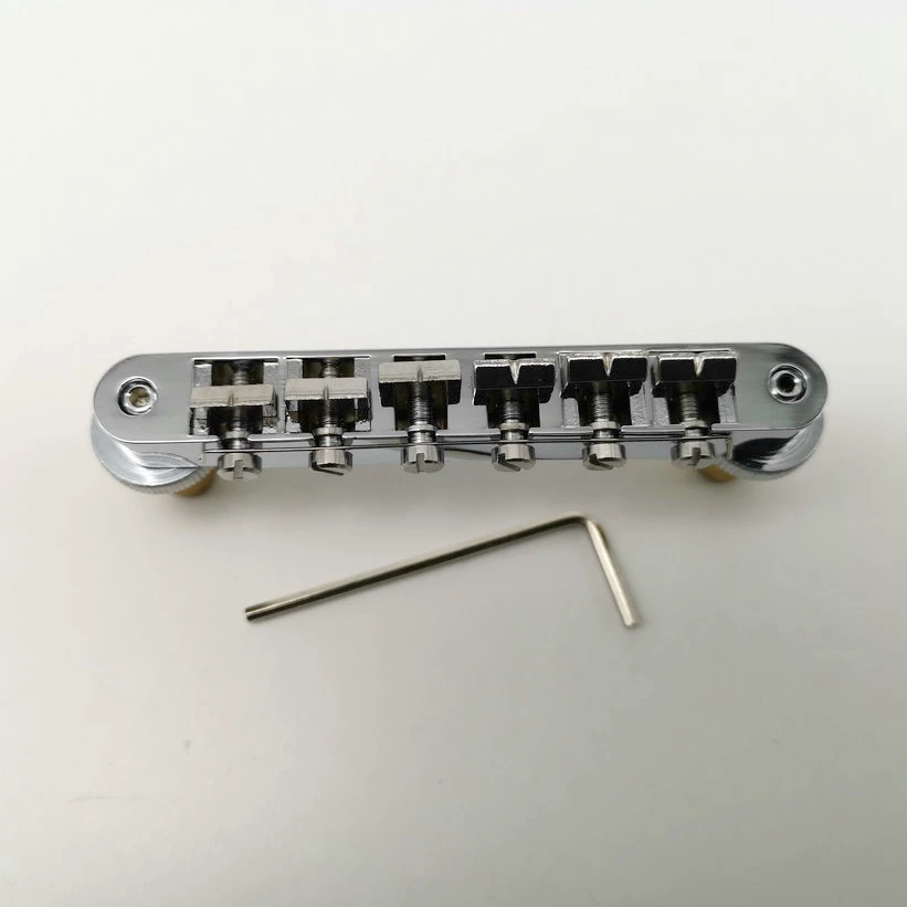 -Мост для электрогитары Matic, 1 комплект, хромированное серебристое золото, роликовое седло Tune-O для электрогитары LP SG (BM003), Сделано в Корее
-Мост для электрогитары Matic, 1 комплект, хромированное серебристое золото, роликовое седло Tune-O для электрогитары LP SG (BM003), Сделано в Корее