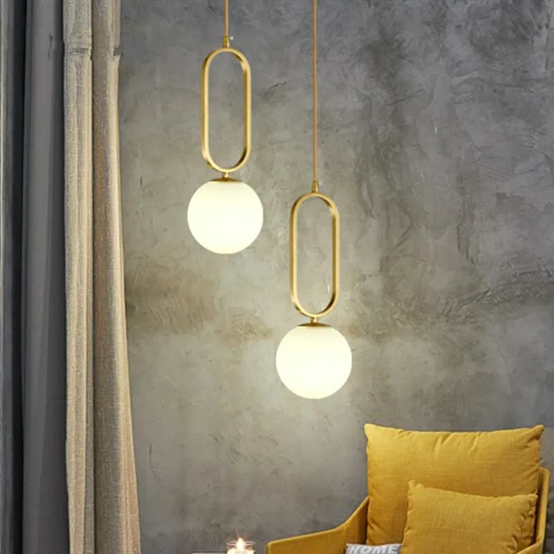 Фото Nordic стеклянные шаровые подвесные светильники металлической пряжкой Золотая