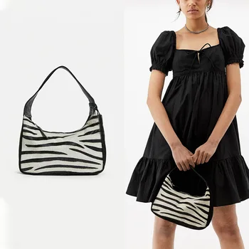 Zebra cow pattern Underarm Bag Female 2020 New Niche Design Crescent Package Lovely Personality Hand Bag Package Shoulder Bag
Zebra cow pattern Underarm Bag Female 2020 New Niche Design Crescent Package Lovely Personality Hand Bag Package Shoulder Bag