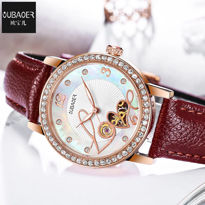 Oubaoer Fashion Machinery Hollow out Night Light Leather Belt Waterproof Ladies' Watch Diamond Set 
Oubaoer Fashion Machinery Hollow out Night Light Leather Belt Waterproof Ladies' Watch Diamond Set