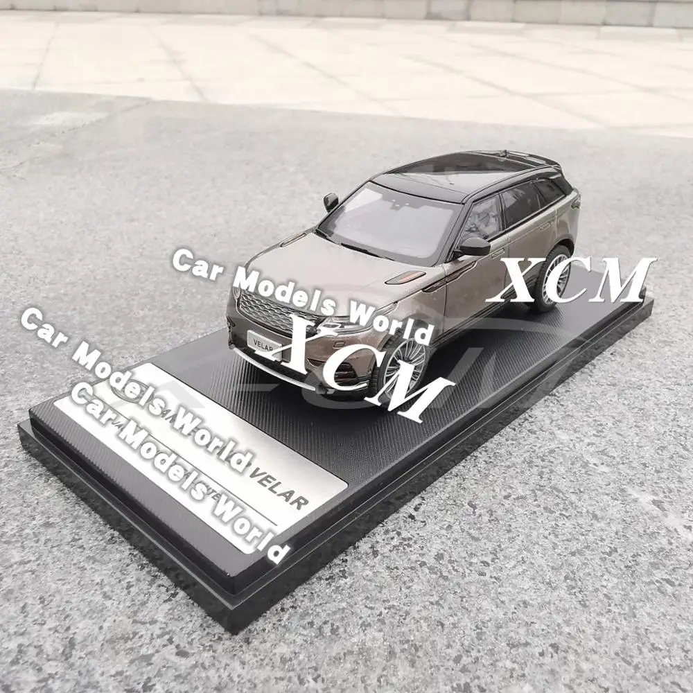 Модель литая автомобиля для моделей LCD Velar 1:43 (коричневый) + небольшой подарок! |