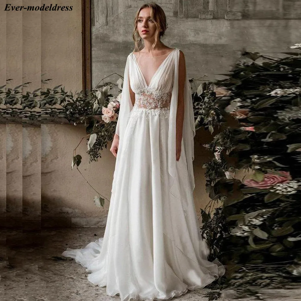 Simple Sheer Neck Boho Wedding Dresses Open Back Cap Sleeves A Line Chiffon Beach Bride Gowns vestidos de novia 2020
Simple Sheer Neck Boho Wedding Dresses Open Back Cap Sleeves A Line Chiffon Beach Bride Gowns vestidos de novia 2020