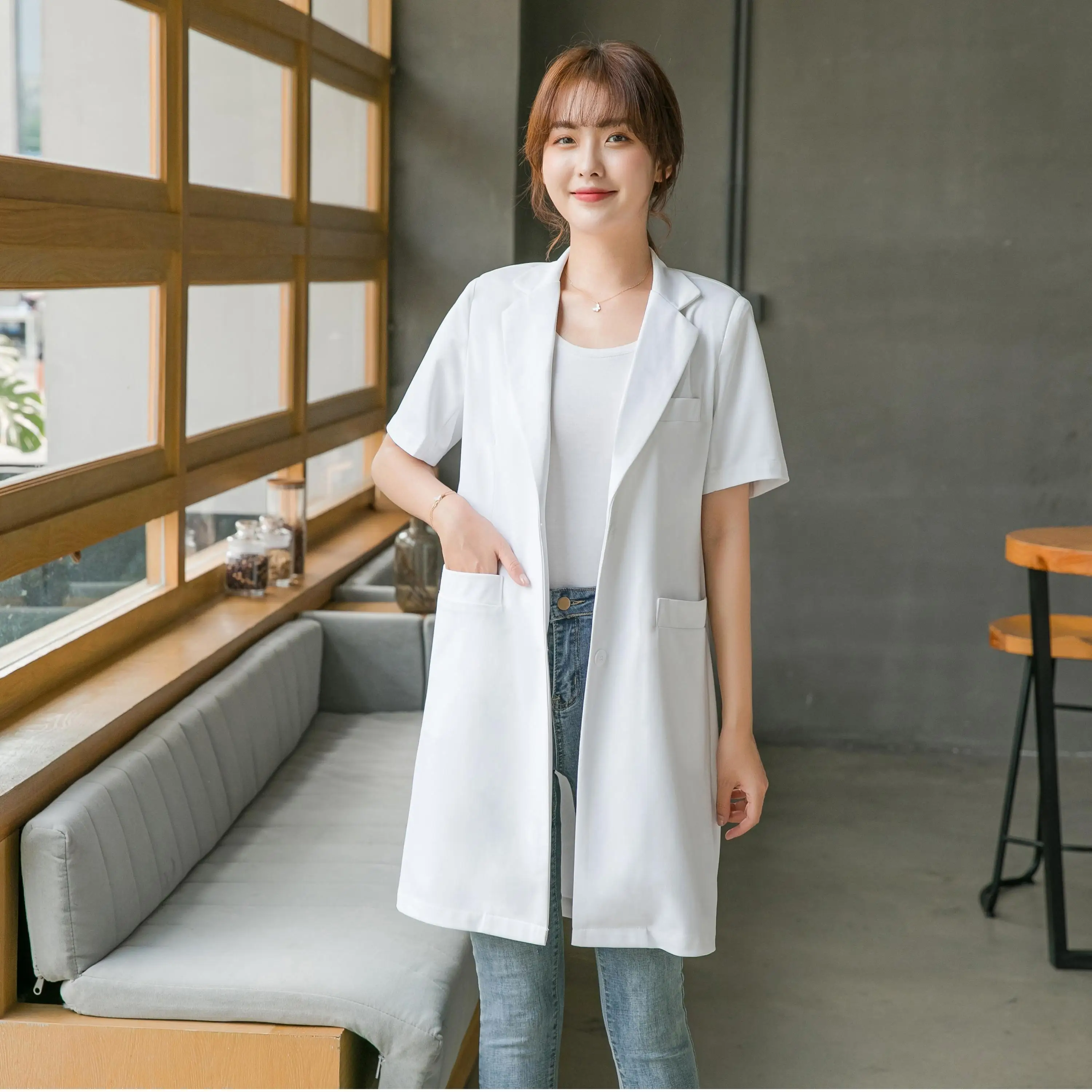 Korean version of the doctor dress oral dental white gown cosmetic skin management short sleeve overalls custom LOGO 
Korean version of the doctor dress oral dental white gown cosmetic skin management short sleeve overalls custom LOGO