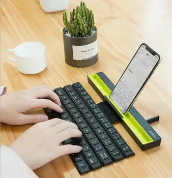 Foldable Reelable Mini Wireless Keyboard 64 Keys Cell phone Stand Holder Keyboard For Tablet Smart Phone
Foldable Reelable Mini Wireless Keyboard 64 Keys Cell phone Stand Holder Keyboard For Tablet Smart Phone