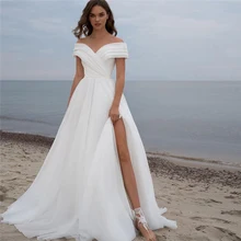Off Shoulder Pleat White Beach Wedding Gown With Slit Sweep Train Bridal Dress For Bride Sleeveless Vintage Robe De Mariage 2021
Off Shoulder Pleat White Beach Wedding Gown With Slit Sweep Train Bridal Dress For Bride Sleeveless Vintage Robe De Mariage 2021