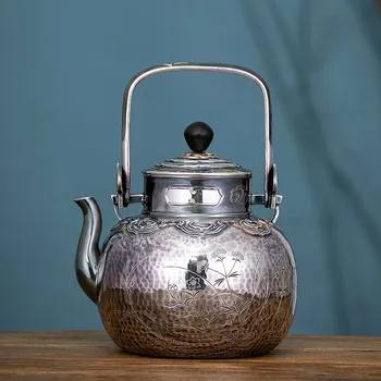 Hand-made boutique Zhen shaped kettle sterling silver engraved mirror surface old Kung Fu tea set tea dual-use silver 
Hand-made boutique Zhen shaped kettle sterling silver engraved mirror surface old Kung Fu tea set tea dual-use silver