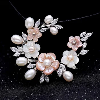 Natural freshwater pearl colored carved shell brooch mother shell brooch micro-set zircon brooch
Natural freshwater pearl colored carved shell brooch mother shell brooch micro-set zircon brooch