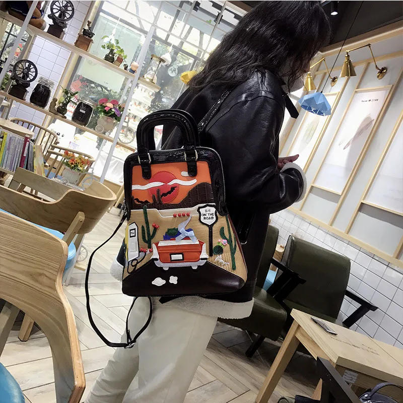 2020 new fashion creative cartoon stitching embroidery craft portable shoulder ladies backpack 
2020 new fashion creative cartoon stitching embroidery craft portable shoulder ladies backpack