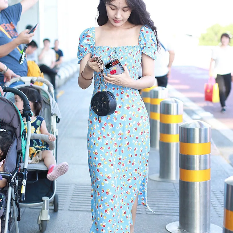 Summer new sweet blue floral puff sleeve dress side slit dress with square neckline printed high waist A-line womens dress
Summer new sweet blue floral puff sleeve dress side slit dress with square neckline printed high waist A-line womens dress