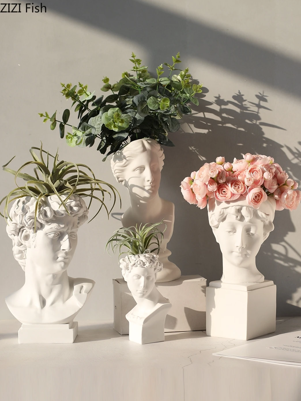 Creative Nordic Resin Human head Portrait vase David Venus Human head Decorative ornaments sculpture Flower arrangement
Creative Nordic Resin Human head Portrait vase David Venus Human head Decorative ornaments sculpture Flower arrangement