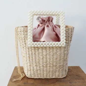 New Pearl Handle Straw Bag Beach Bag Shoulder Hand Bag Women's Papyrus Pearl Straw Bag
New Pearl Handle Straw Bag Beach Bag Shoulder Hand Bag Women's Papyrus Pearl Straw Bag