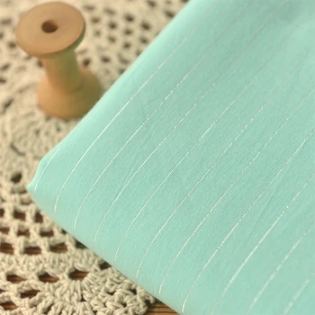 High quality thin pure cotton fabric Mint silver thread fabric cotton Garment handmade DIY fabrics 
High quality thin pure cotton fabric Mint silver thread fabric cotton Garment handmade DIY fabrics