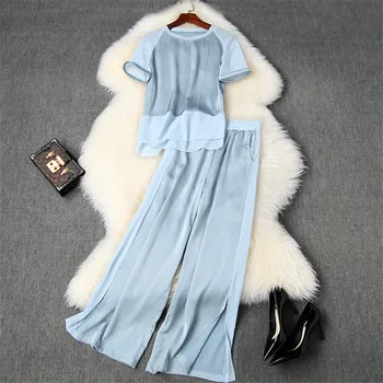 2020 Summer 2 Piece Pants and Top Set Women Fashion Designers Lady Elegant Outfits Diamonds Irregular Chiffon Blouse Pants Suit
2020 Summer 2 Piece Pants and Top Set Women Fashion Designers Lady Elegant Outfits Diamonds Irregular Chiffon Blouse Pants Suit