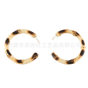 Wood roasted black two color leopard pattern opening double-C slub Earrings versatile round ring bamboo rattan Earrings
Wood roasted black two color leopard pattern opening double-C slub Earrings versatile round ring bamboo rattan Earrings